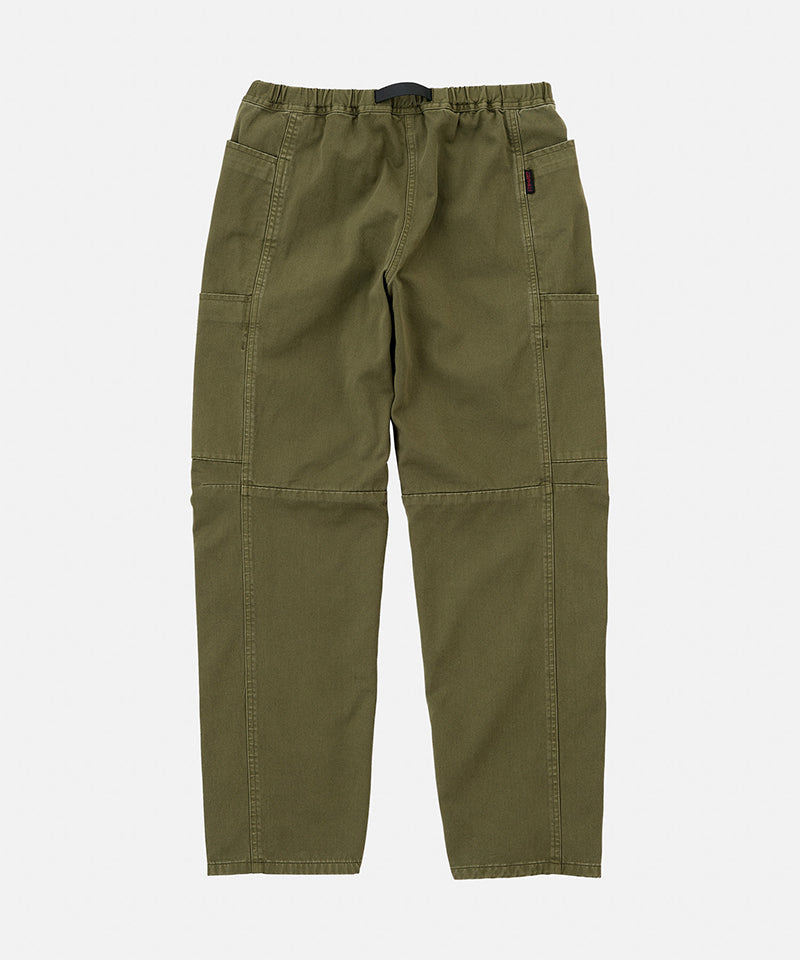 Back view of army pigment colored Gramicci Voyager Pants on a light-tone background.