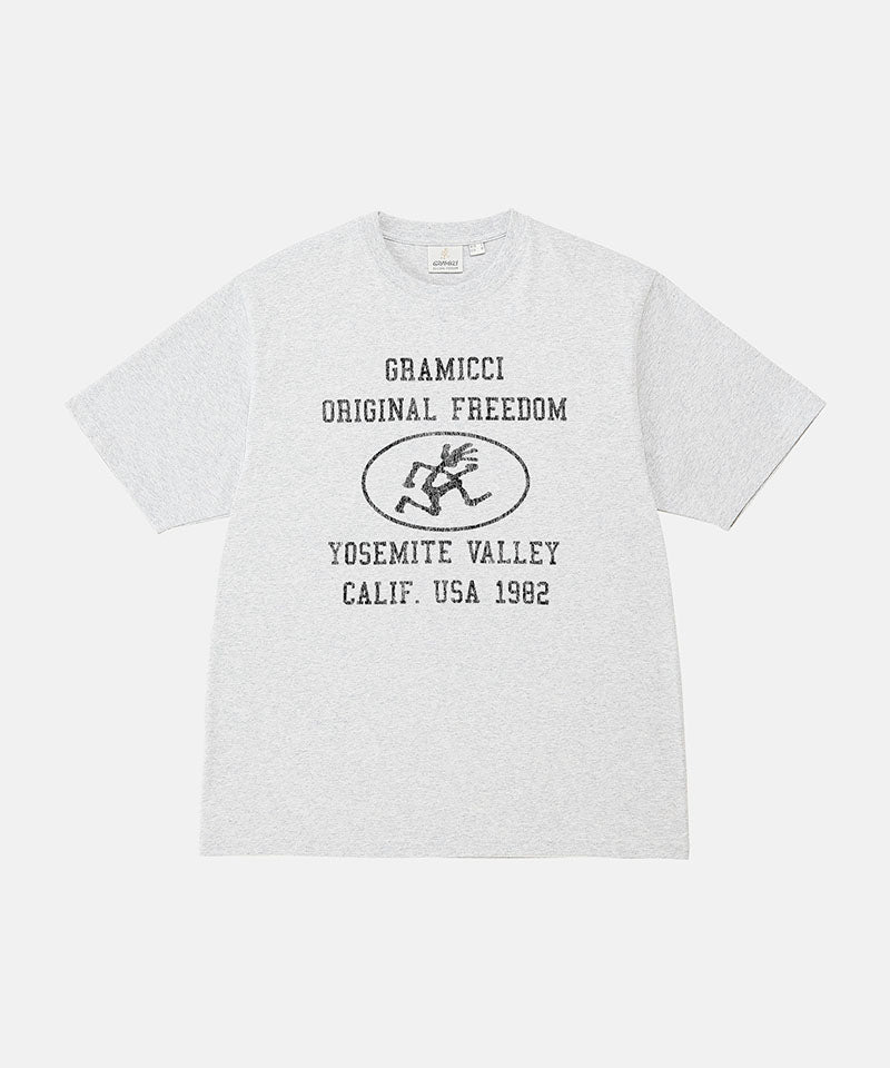 Gramicci ash heather colored Yosemite Valley Tee with a graphic against a light-tone background.