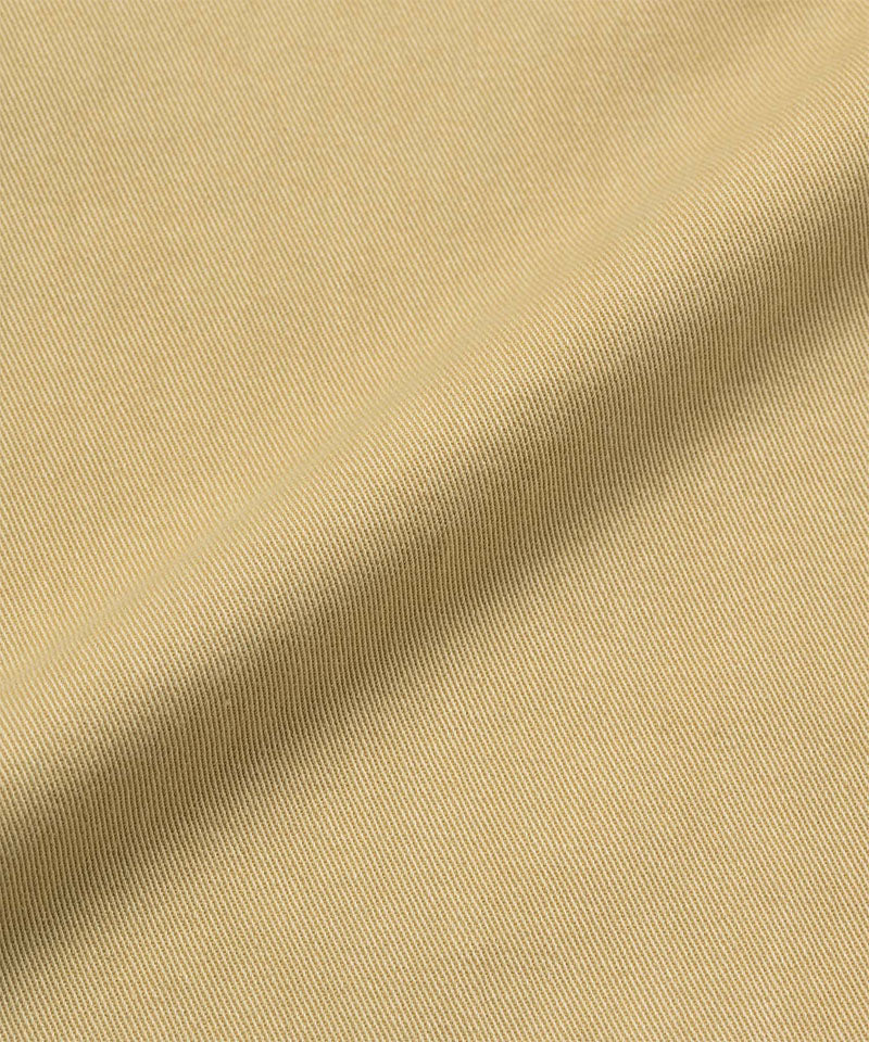 Close-up of beige fabric with a subtle texture