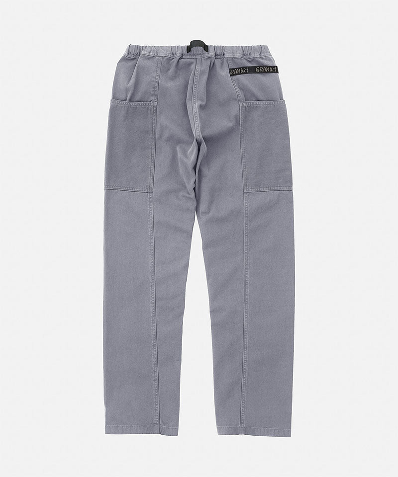 Back view of a Gramicci natural dyed grey Gadget Pants against a light-tone background.