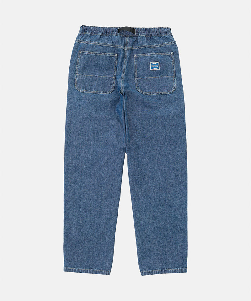 Rear view of the Gramicci Japanese Chambray Double Knee pant in blue against a light tone background.
