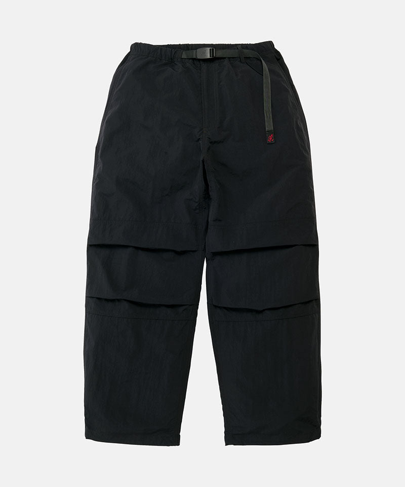 Black Gramicci Nylon Paneled Trek Pants with a belt against a light-tone background.