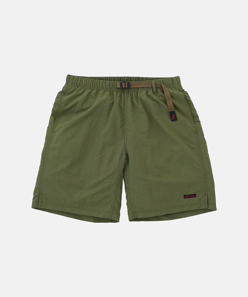 Olive Gramicci Nylon Packable G-Shorts with a belt against a light-tone background.