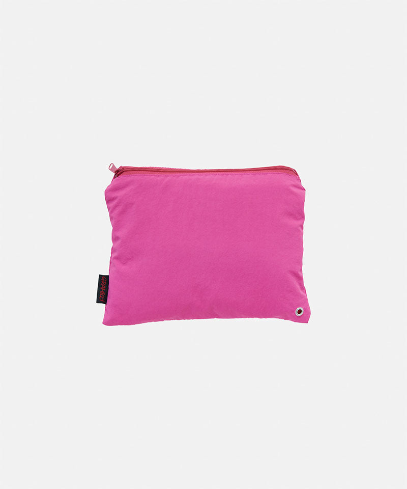 Bright plum colored Gramicci Nylon Packable G-Short in a carrying pouch on a light-tone background.