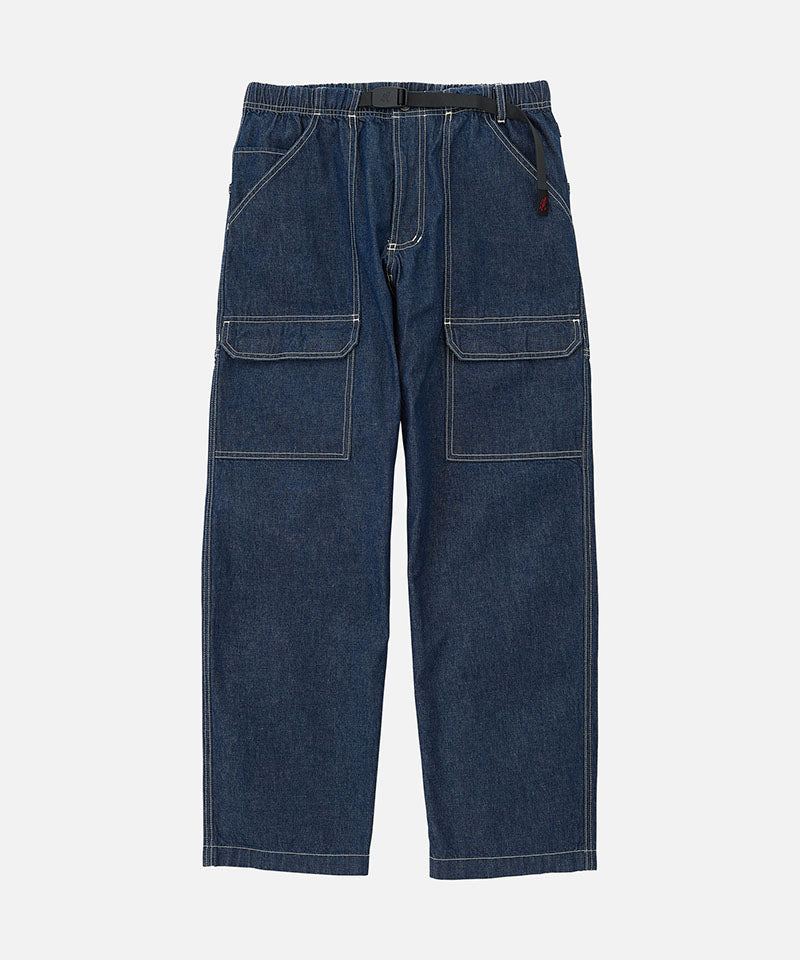 Rinsed indigo Gramicci Denim EQT Pant with a belt against a light-tone background.
