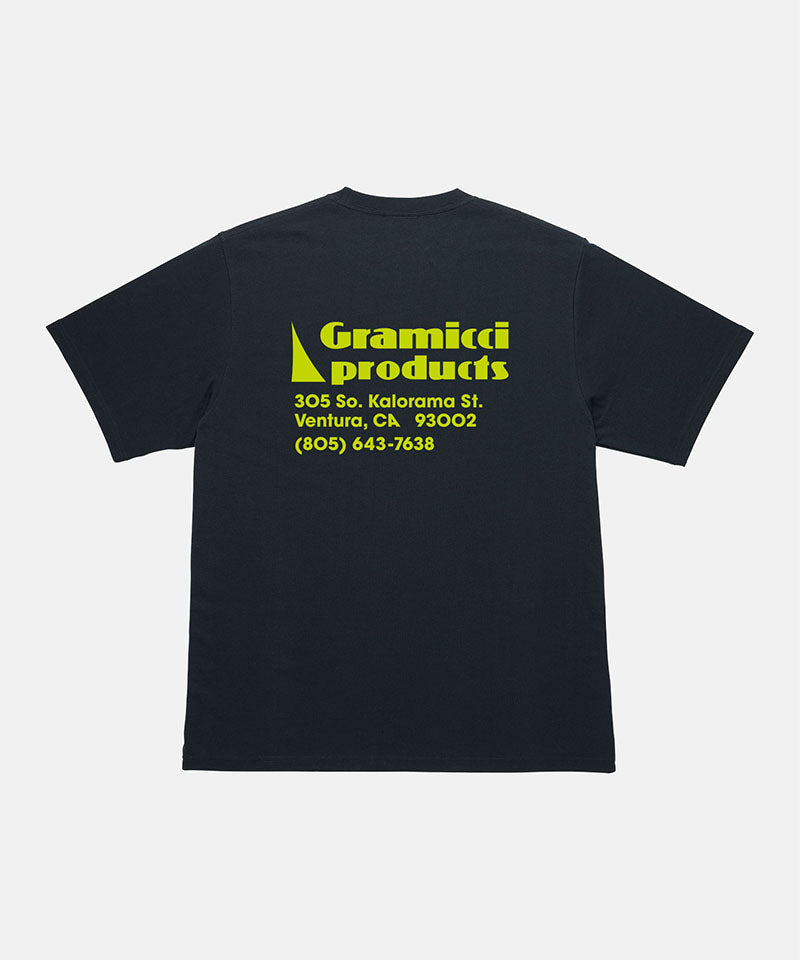 Back view of a Gramicci vintage black Running Man Tee with graphic against a light tone background.