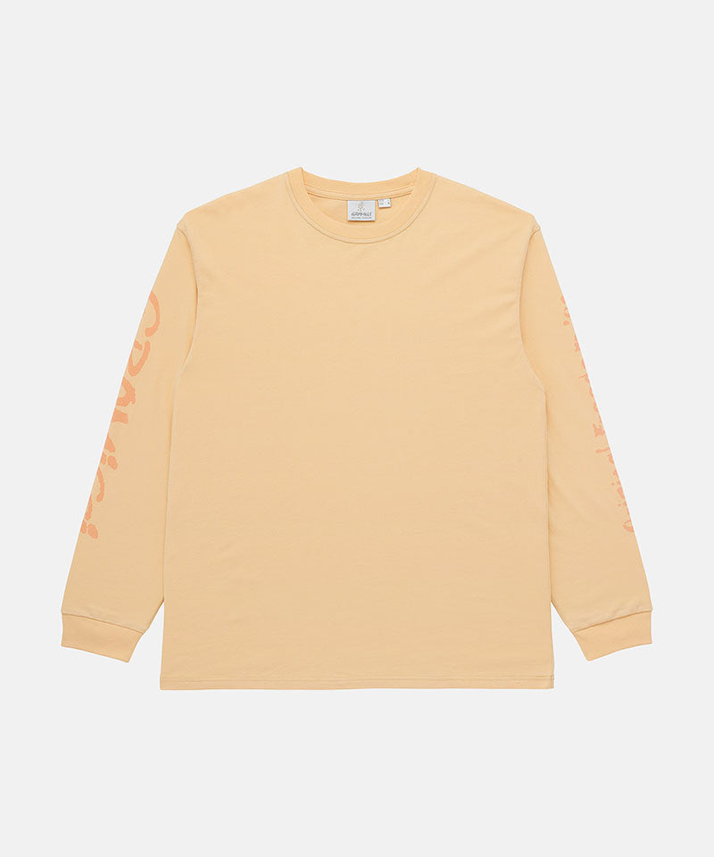 Gramicci mango colored Freedom L/S Tee with dark mango colored graphic on sleeves against a light tone background.
