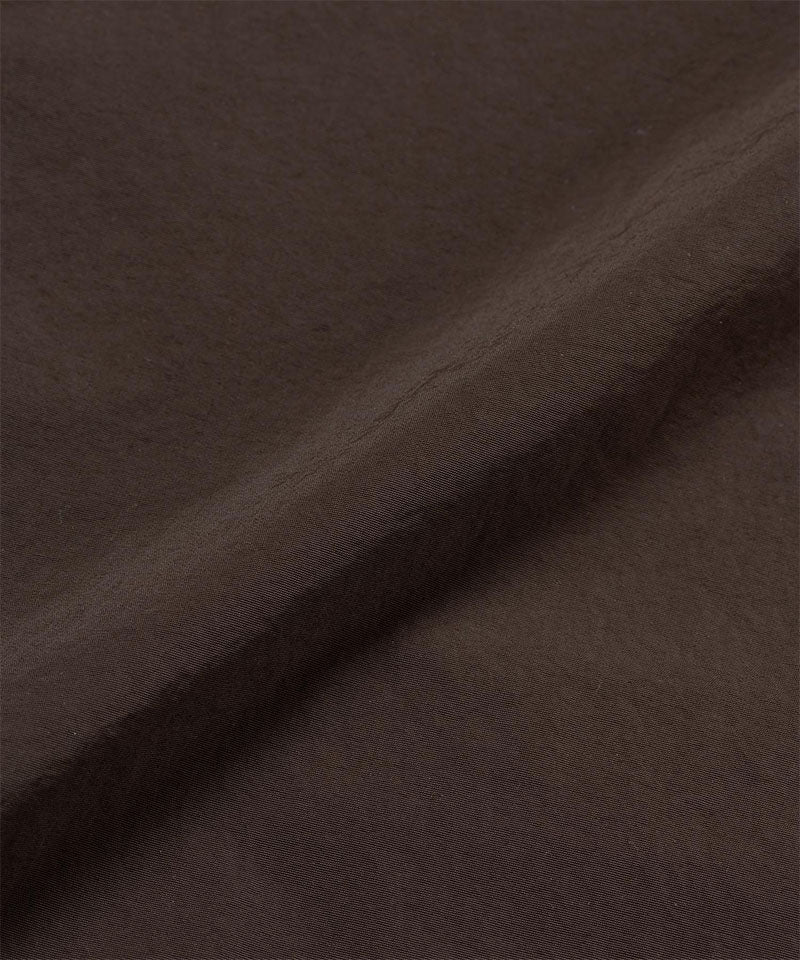 Chocolate colored Gramicci Nylon Dress fabric swatch.