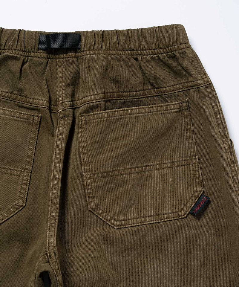Back view close-up of bark pigment colored Gramicci Women's Brooks Pants on a light-tone background.
