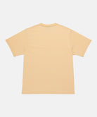 Back view of a Gramicci mango colored One Point Tee against a light-tone background.