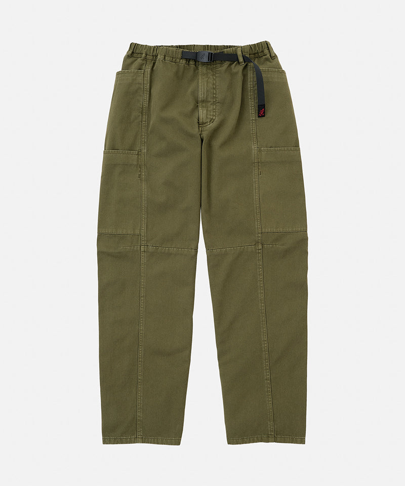 Army pigment colored Gramicci Voyager Pants with a belt against a light-tone background.
