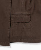 Close-up of Gramicci G-Skort in the color chocolate against a light-tone background.