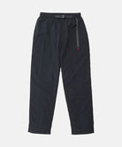 Black Nylon Gramicci Pants with a belt against a light-tone background.