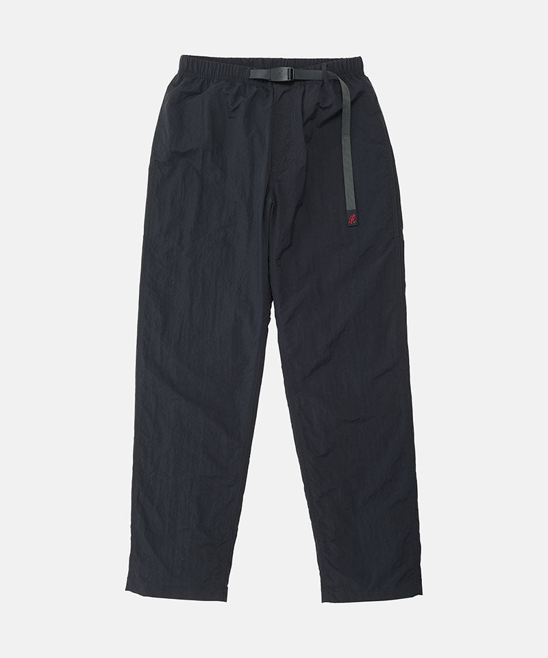 Black Nylon Gramicci Pants with a belt against a light-tone background.