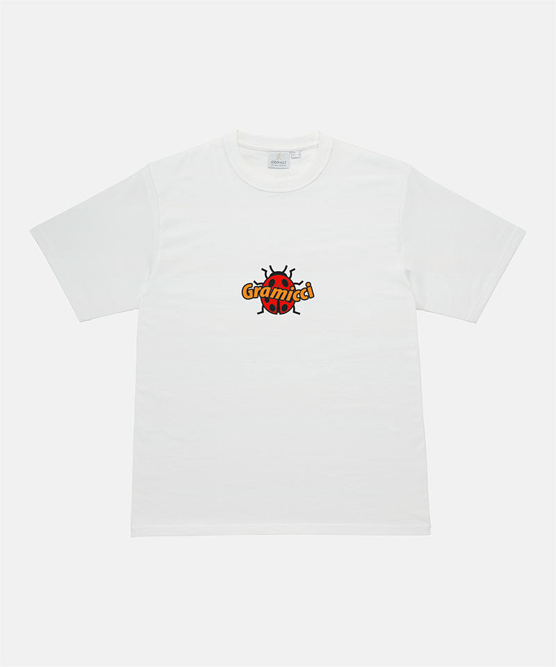 Gramicci white Ladybug Tee with a graphic against a light-tone background.