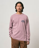 Model wearing a Gramicci lilac pigment GCE Long Sleeve Tee Pigment Dyed against a light-tone background.