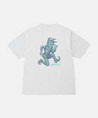 Back view of a Gramicci ash heather color Joker Tee with a teal graphic against a light-tone background.