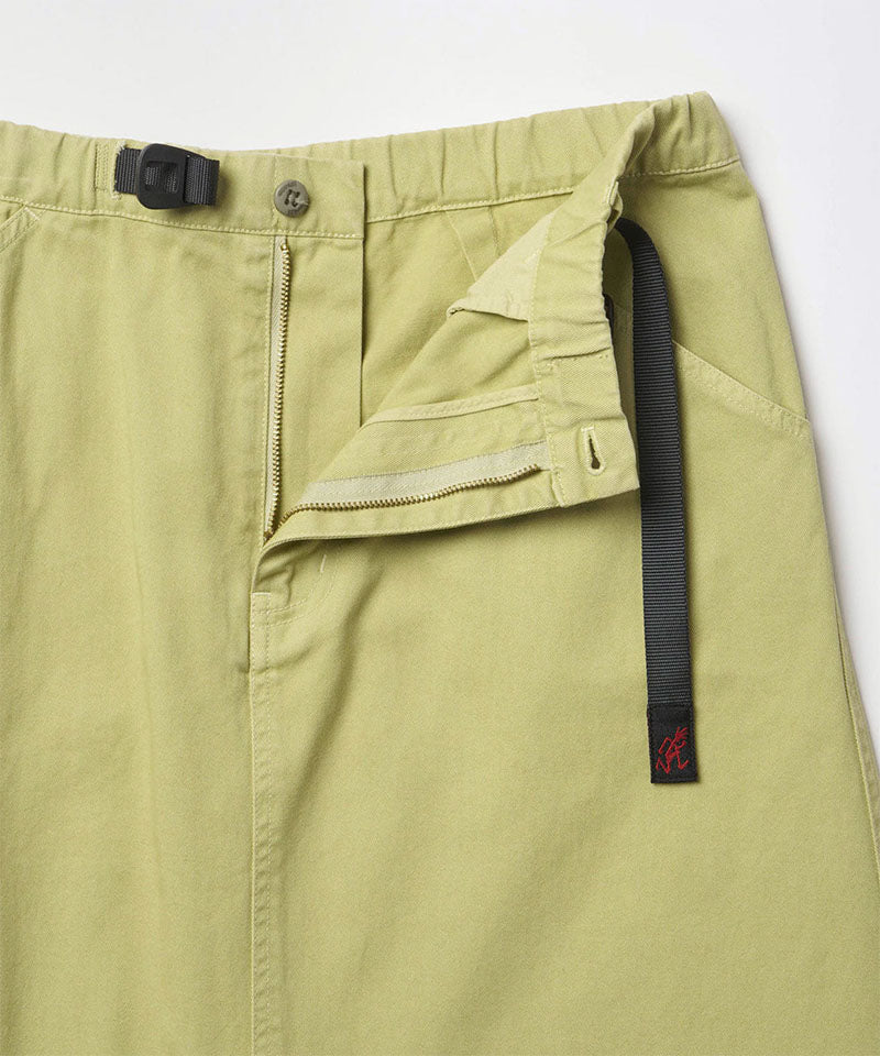 Close-up of the waistband on a elm pigment colored Gramicci Gramicci 5-Pocket Skirt on a light-tone background.