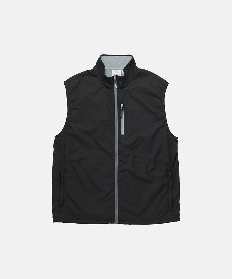 Gramicci black Flyweight Vest against a light-tone background.
