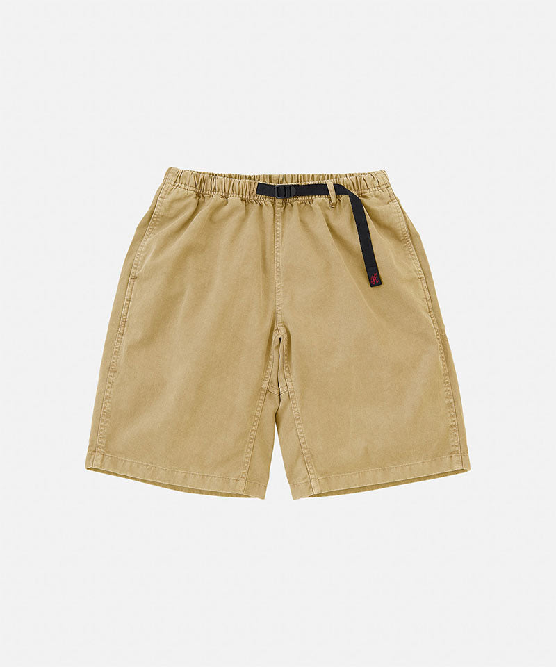 Chino colored Gramicci Natural Dyed Jam Short with a belt against a light-tone background.