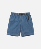 Blue Gramicci Japanese Chambray Shorts with a belt against a light-tone background.