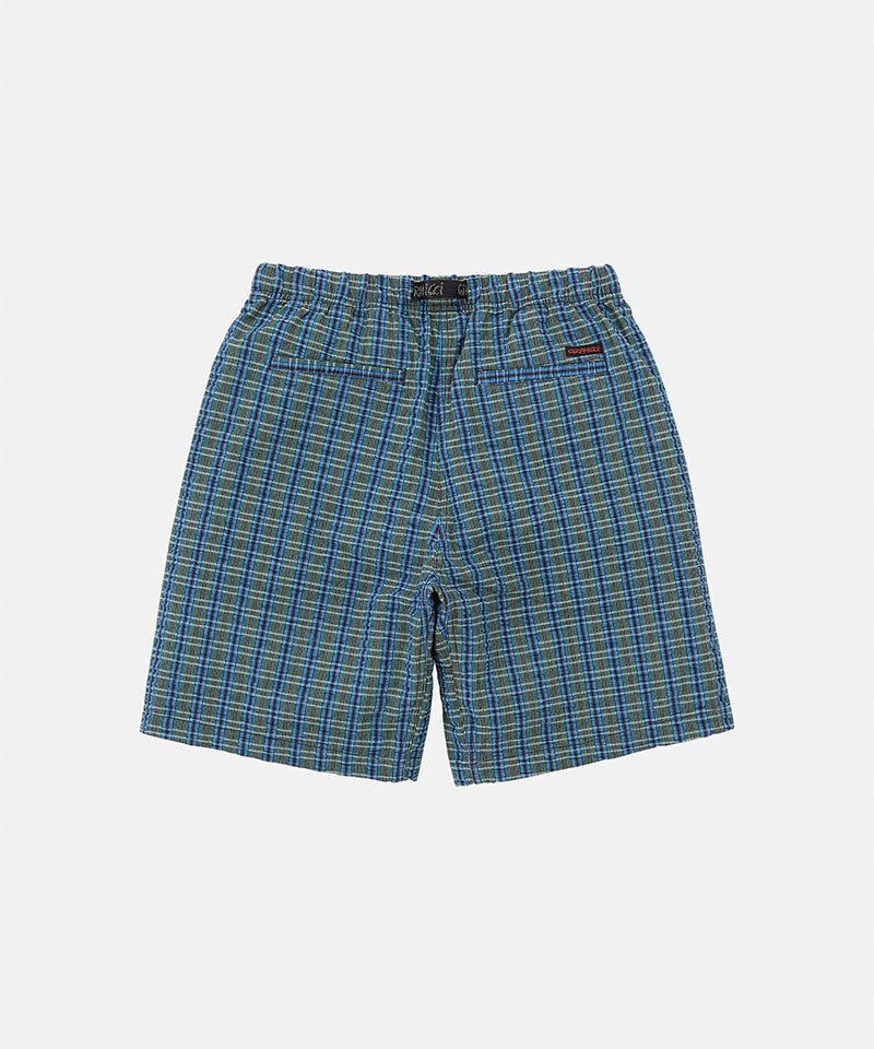 Back view of a Gramicci blue multistripe Gramicci O.G. G-Short Seersucker Plaid against a light-tone background.