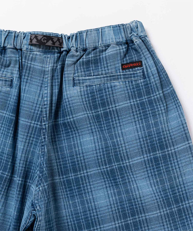 Back view close-up of the indego Gramicci Lagoon Short Denim Plaid on a light-tone background.