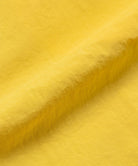 Banana colored colored Gramicci Nylon Block Shorts fabric swatch.