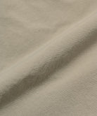 Milk tea colored colored Gramicci Nylon Cliff Short fabric swatch.