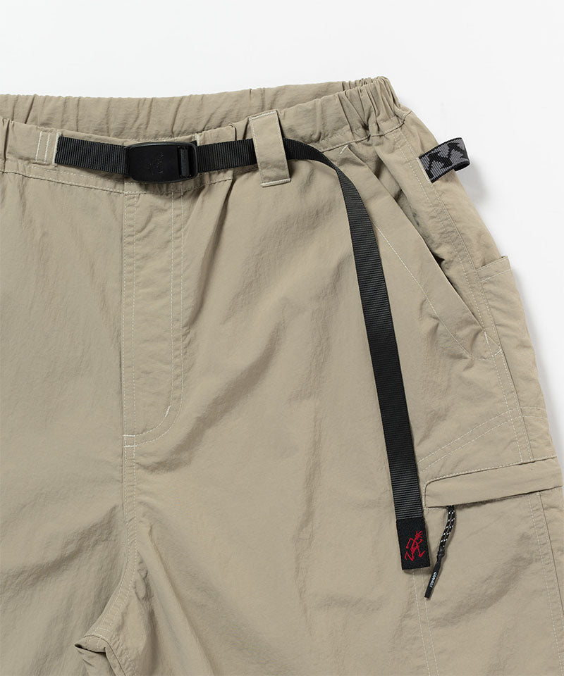 Close-up view of milk tea colored Gramicci Nylon Cliff Short on a light-tone background.