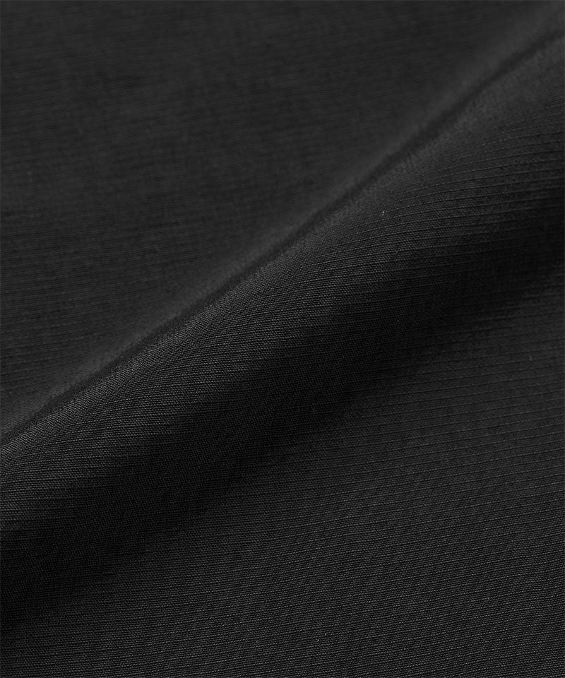 Black colored Gramicci Convertible Cargo Pants fabric swatch.