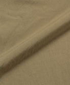 Khaki colored Gramicci Convertible Cargo Pants fabric swatch.