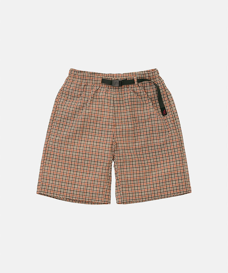Brick check colored Gramicci Checkered Shell Shorts with a black belt against a light-tone background.