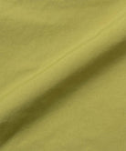 Gramicci field green colored Guide Shorts fabric swatch.