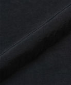 Black colored Gramicci Nylon Paneled Trek Pants fabric swatch.