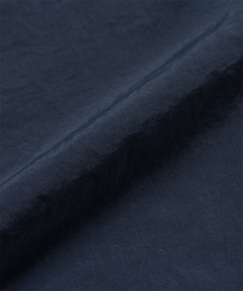British navy colored Gramicci Nylon Paneled Trek Pants fabric swatch.