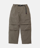 Granite colored Gramicci Nylon Paneled Trek Pants with a belt against a light-tone background.