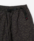Close-up view of brown leaf colored Gramicci Nylon Packable G-Short on a light-tone background.