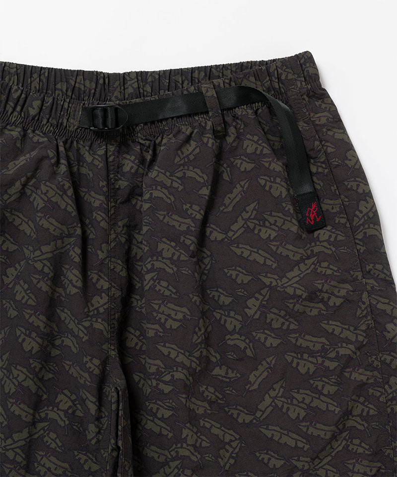 Close-up view of brown leaf colored Gramicci Nylon Packable G-Short on a light-tone background.
