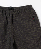 Back view close-up of brown leaf colored Gramicci Nylon Packable G-Short on a light-tone background.