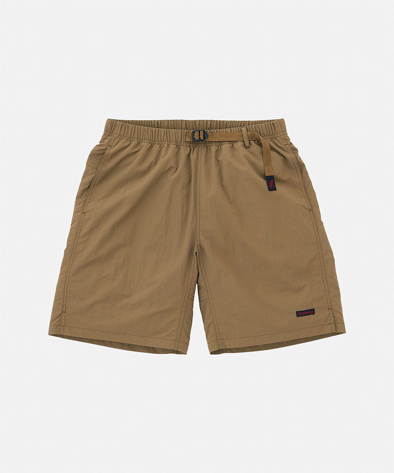 Coyote colored Gramicci Nylon Packable G-Shorts with a belt against a light-tone background.