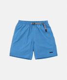 Marine colored Gramicci Nylon Packable G-Shorts with a belt against a light-tone background.