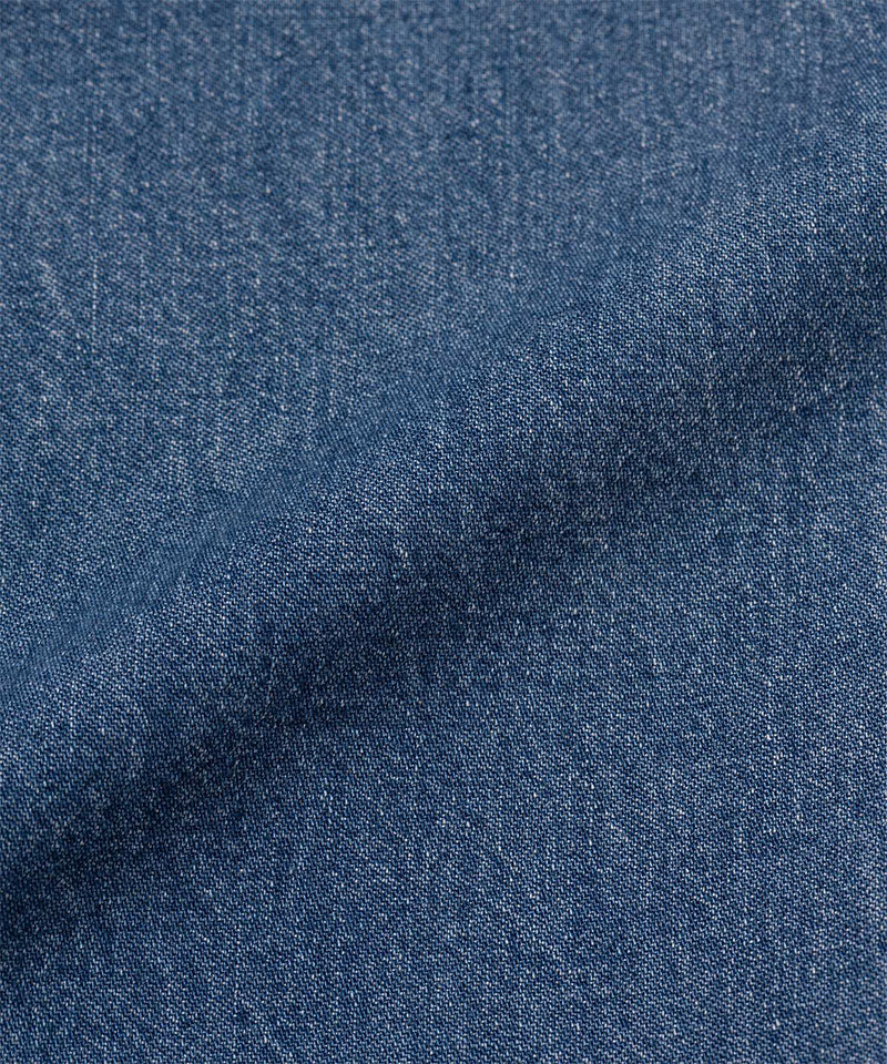 Light wash colored colored Gramicci Denim EQT Pant fabric swatch.