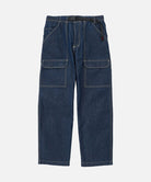 Rinsed indigo Gramicci Denim EQT Pant with a belt against a light-tone background.