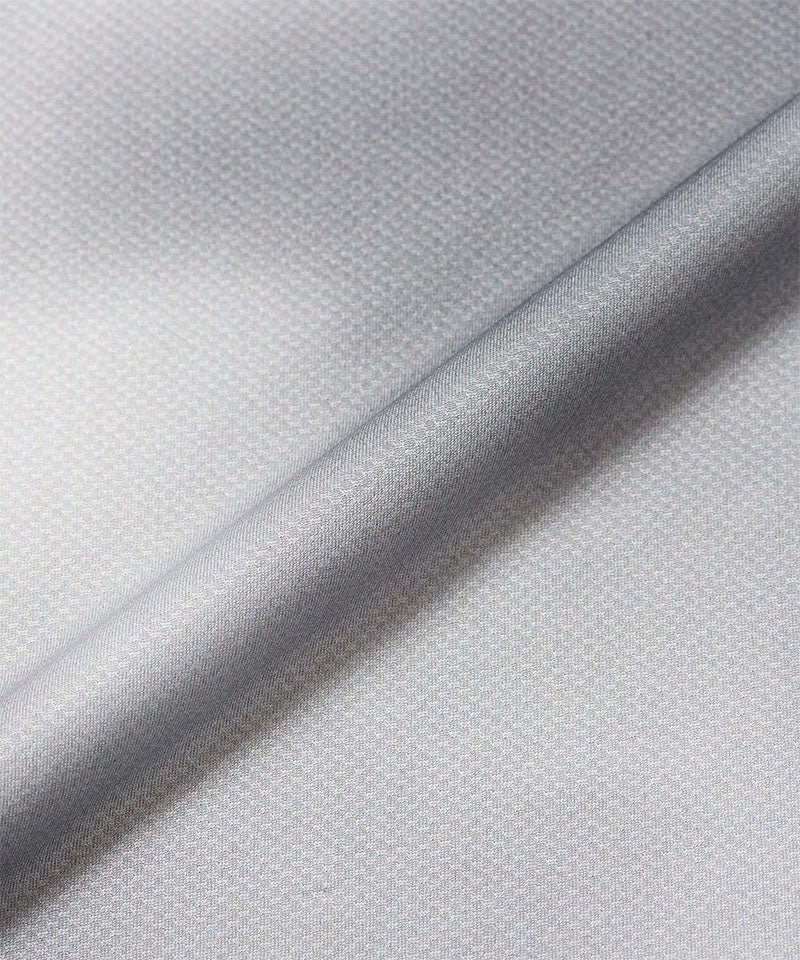 Gramicci black tie-dye L/S 1st Layer shirt fabric swatch.