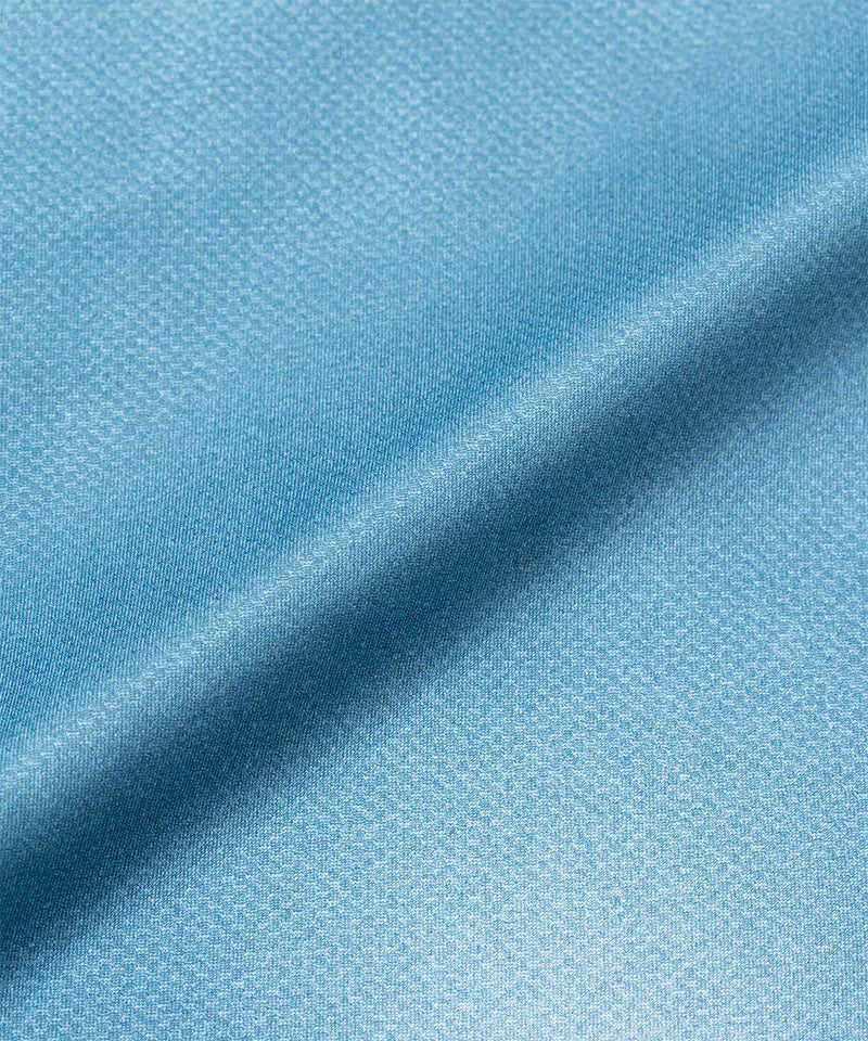 Gramicci blue tie-dye L/S 1st Layer shirt fabric swatch.