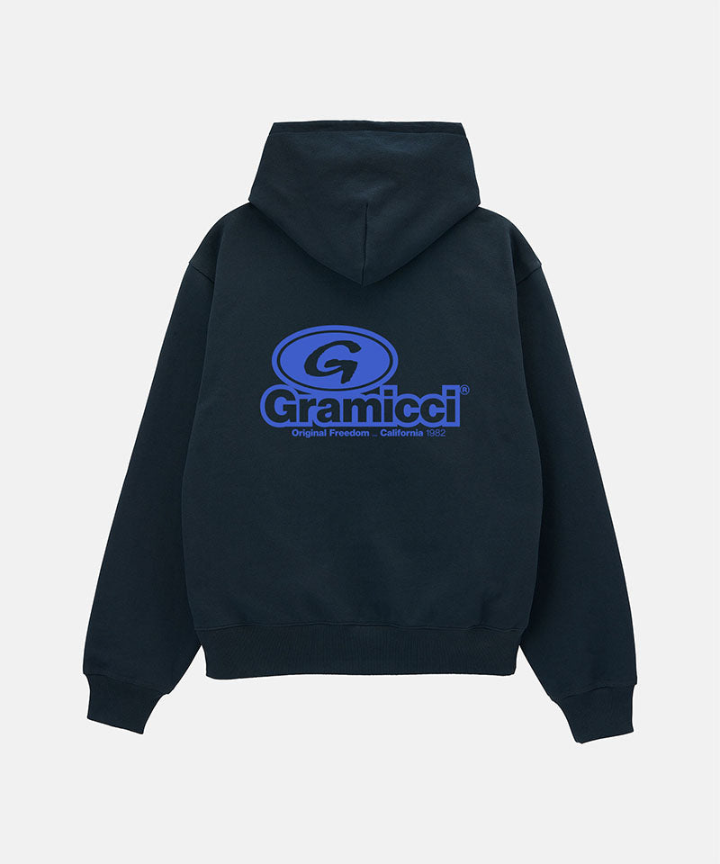 Back view of a Gramicci vintage black '82 Zip Hooded Sweatshirt with a blue graphic against a light-tone background.