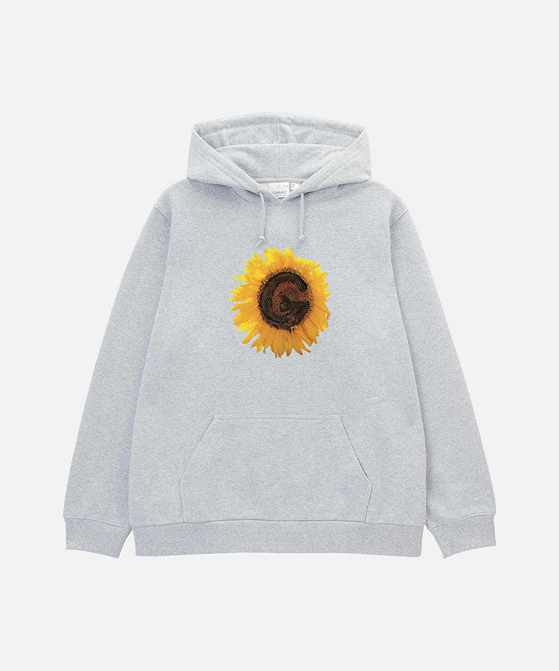 Gramicci heather grey G-Flower Hooded Sweatshirt with a sunflower graphic against a light-tone background.