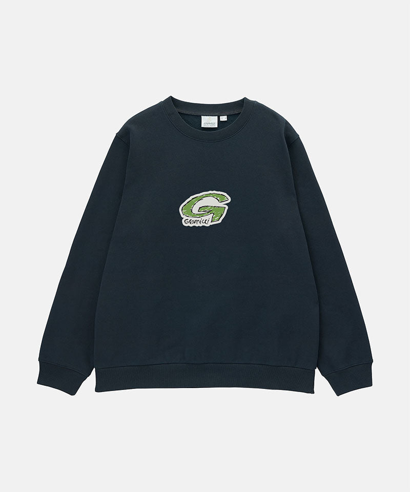 Gramicci vintage black G-Scribble Sweatshirt with green graphic against a light tone background.