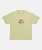 Gramicci lime Pomegranate Tee with a graphic against a light-tone background.